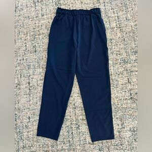 Lululemon Size 8 Keep Moving Pant 7/8 High-Rise NAVY BLUE with Drawstring.